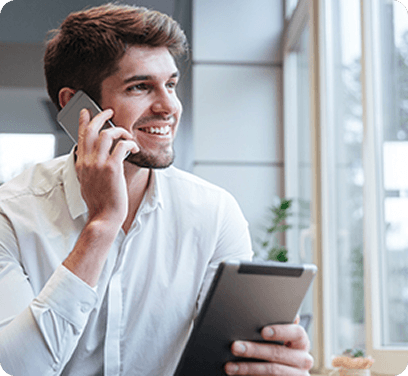 Man on the phone and smiling